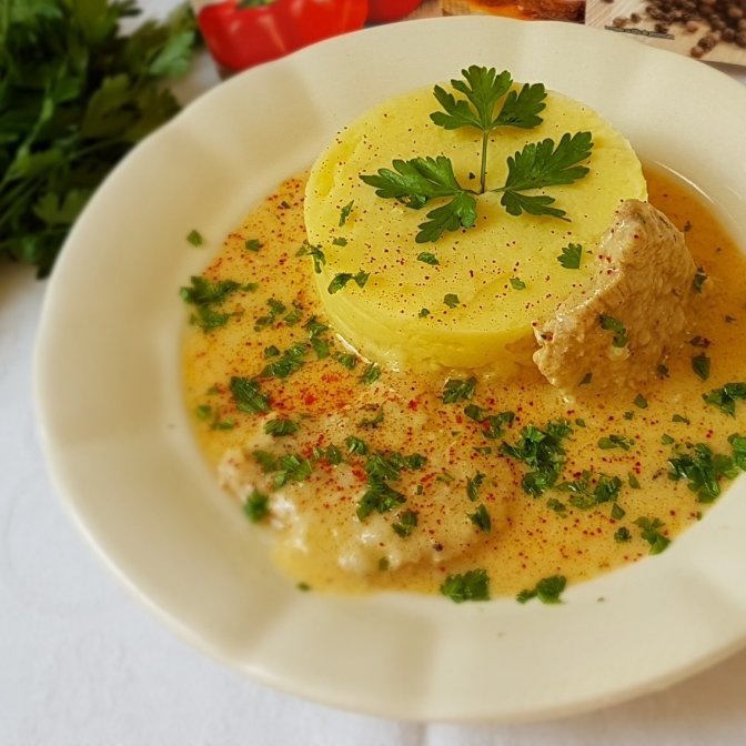 Escalop de porc in sos de mustar